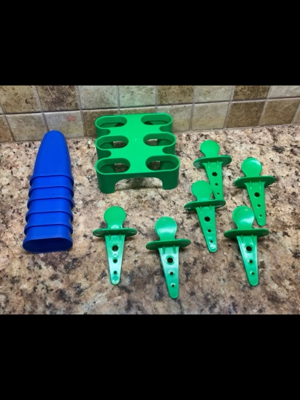 IKEA Plastic Popsicle Maker Molds in Green with Blue Covers and Green Tray.